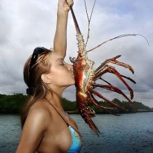 Girl kissing lobster Girl kissing lobster