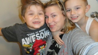Alicia Hardesty's fiancé, Ashley, with her boys, Joshua and Nicolas