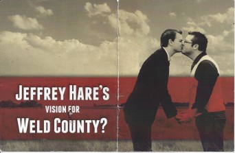Attack Ad with gay couple's engagement photo
