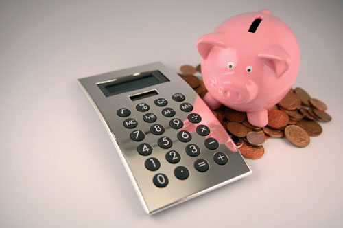 Piggy bank, calculator, coins
