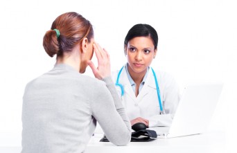 Female doctor with female paitient