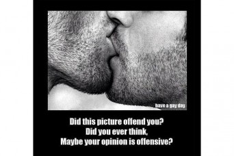 Two men kissing