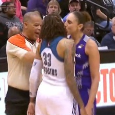 WNBA stars on court kiss