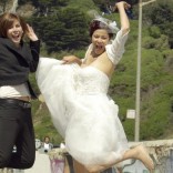 Lesbian couple in their wedding gear.