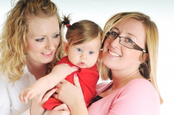 Two women with a baby