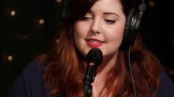 Mary Lambert with headphones