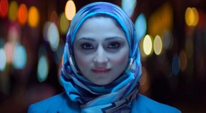 Woman in multicultural Coca Cola ad