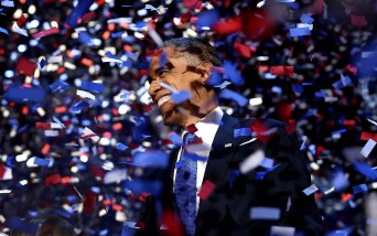 President Barack Obama amidst confetti after giving his victory speech