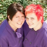 Lesbian couple in chef coats