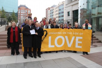 Same sex marriage supporters gather at Arlington County courthouse.