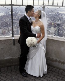 Stephanie Figarelle, left, and Lela McArthur as they wed atop the Empire State Building, Valentine's Day 2012.