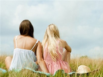 Two girls in field