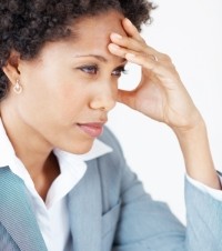 woman holding head
