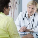 9 questions to ask your gynecologist Woman talking to doctor