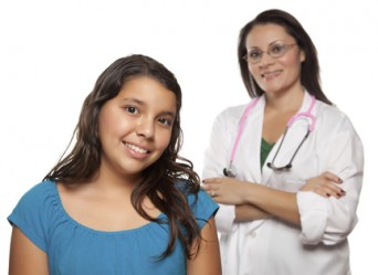 Young woman with female doctor